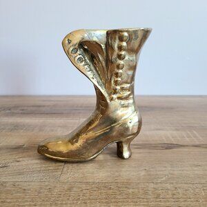Solid brass boot shape vase figurine.